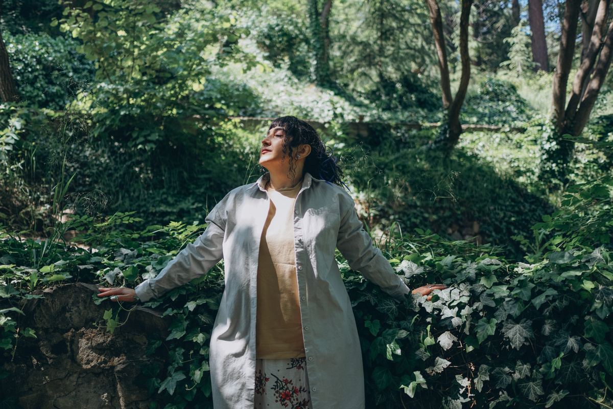 Woman Relaxing in Forest